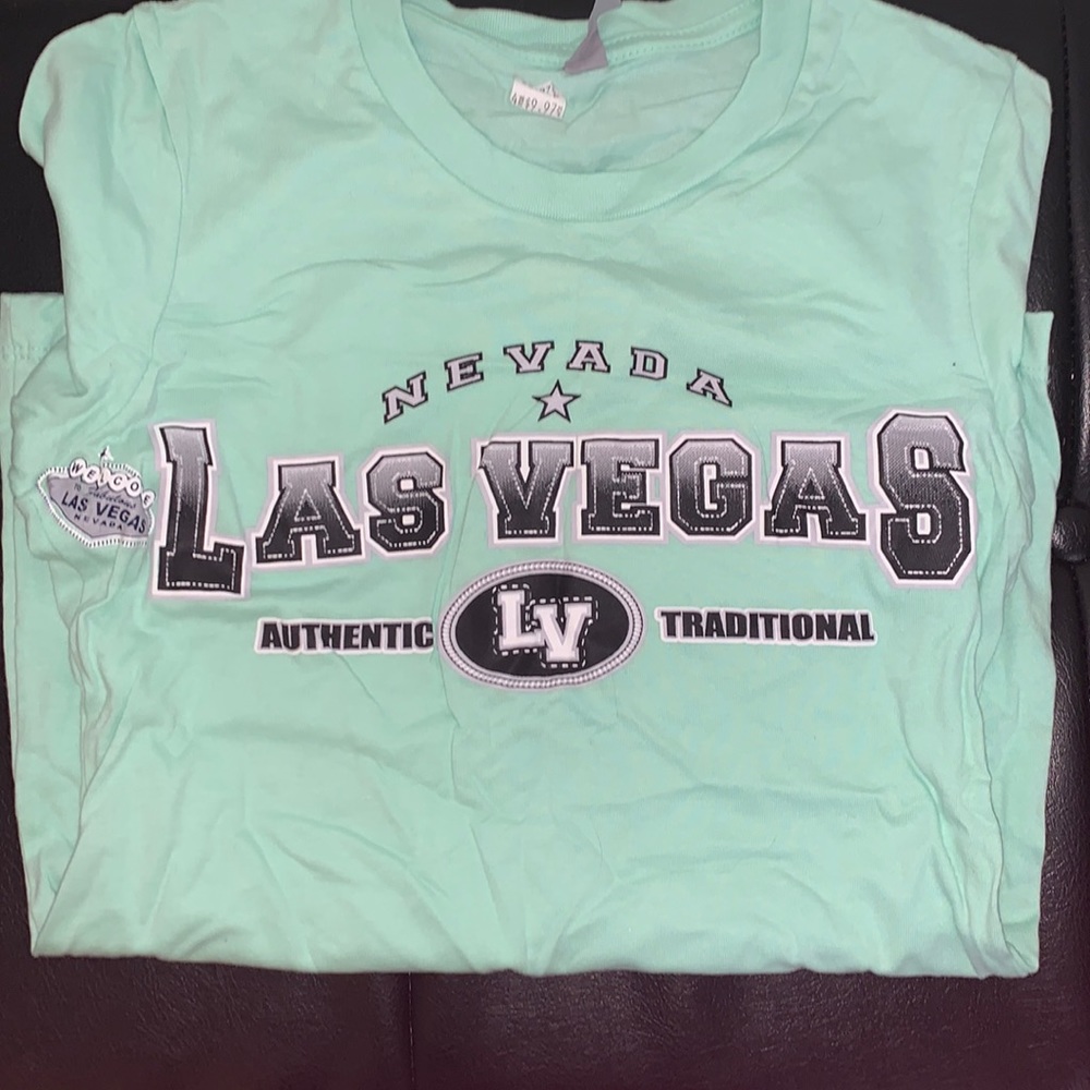 teal tee shirt